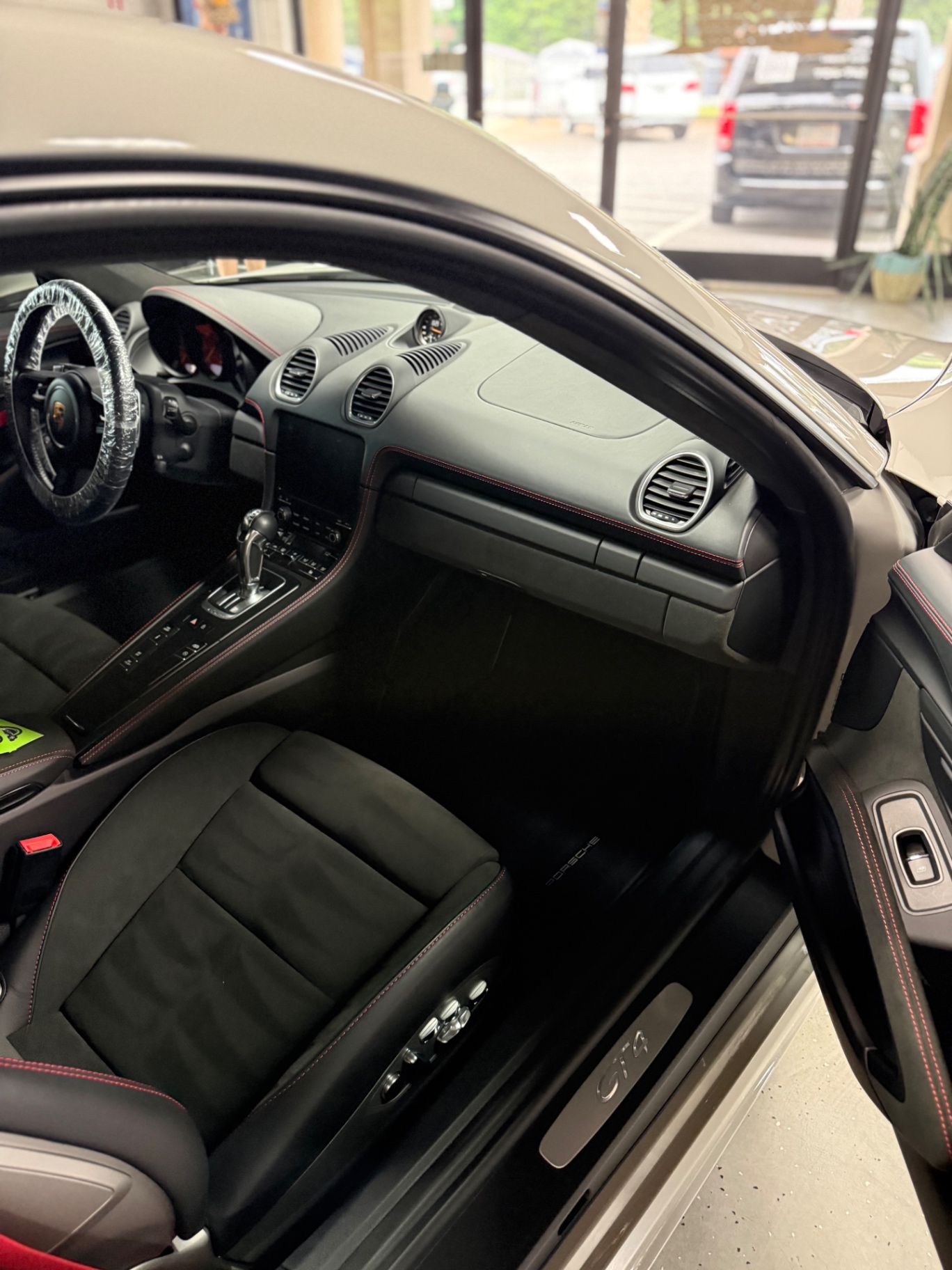 Porsche GT4 dashboard and alcantara seats detailed